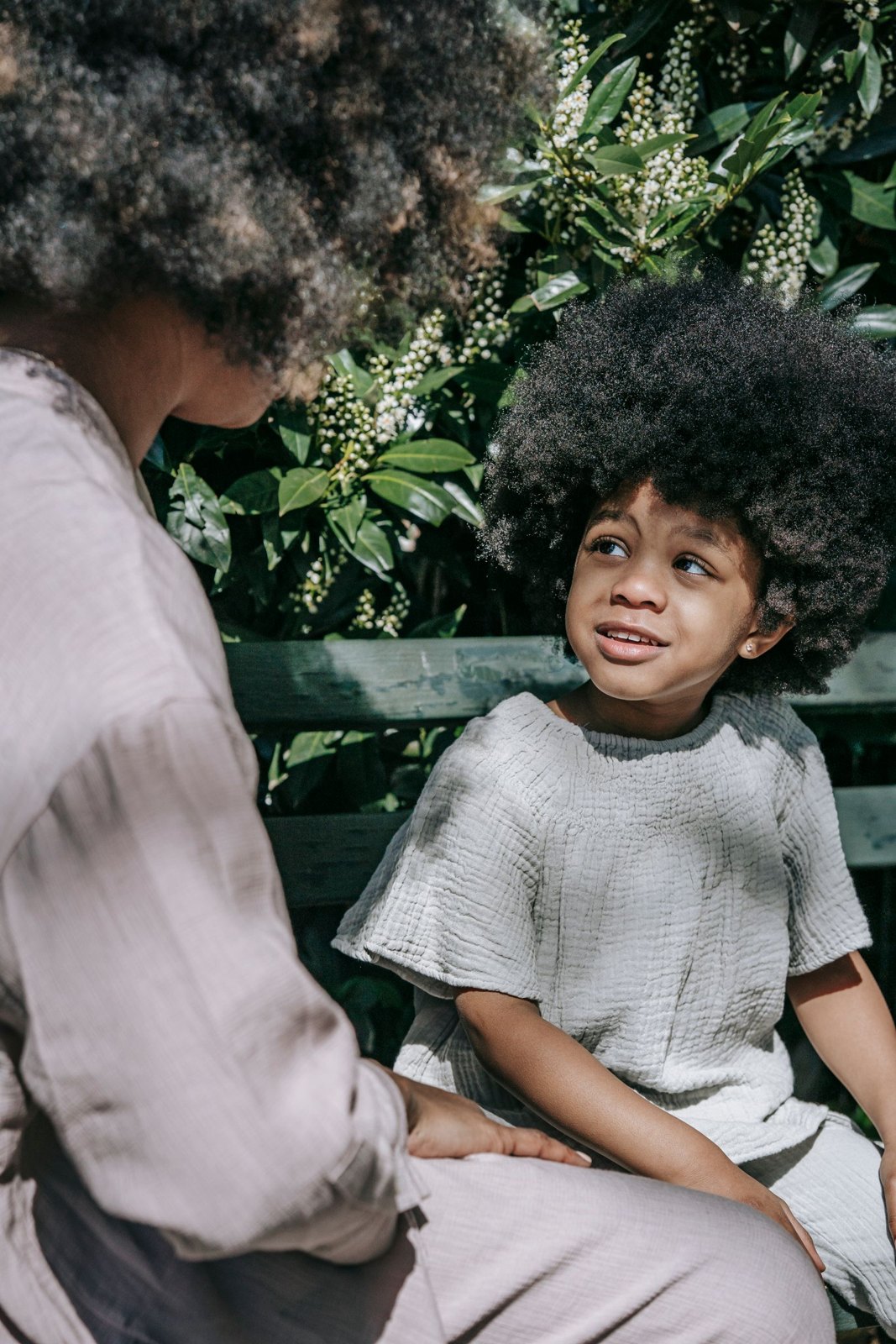A child talking to her parent