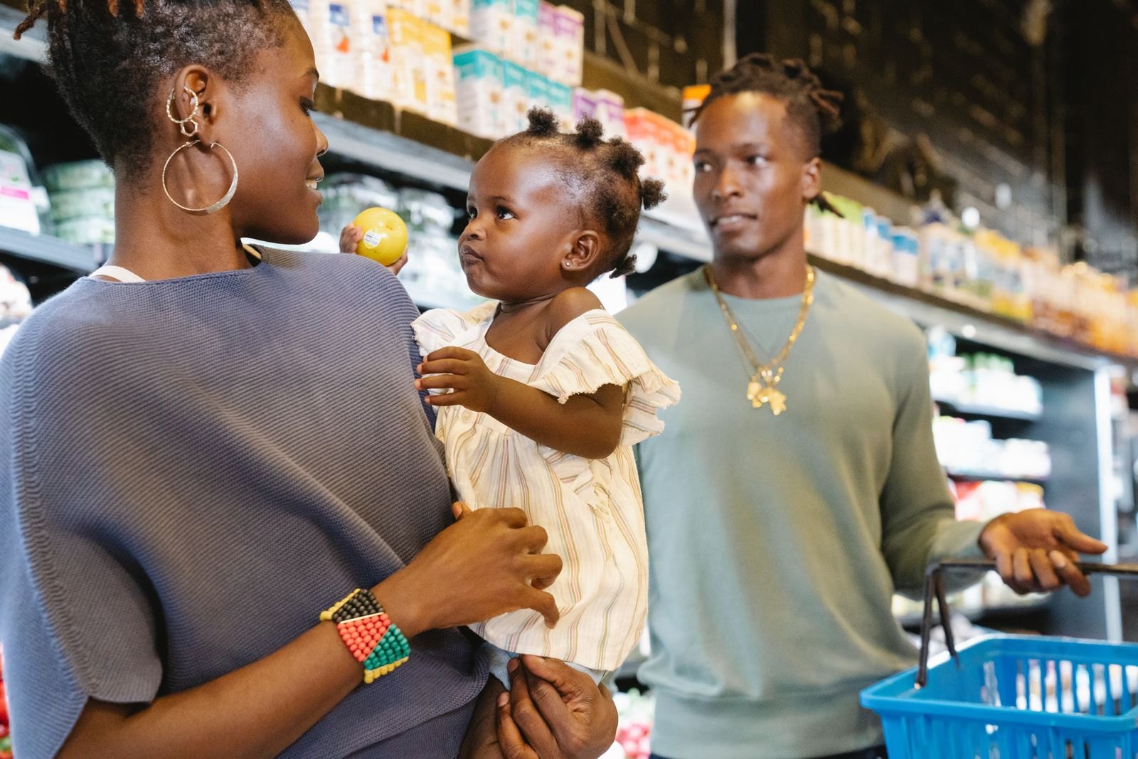 Family looking at groceries in a store