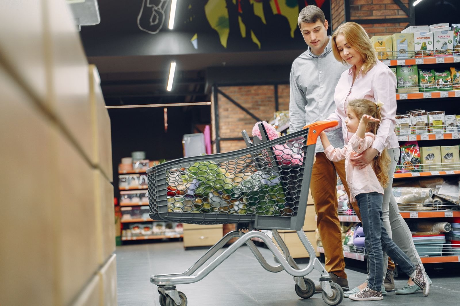Family doing shopping in the grocery store