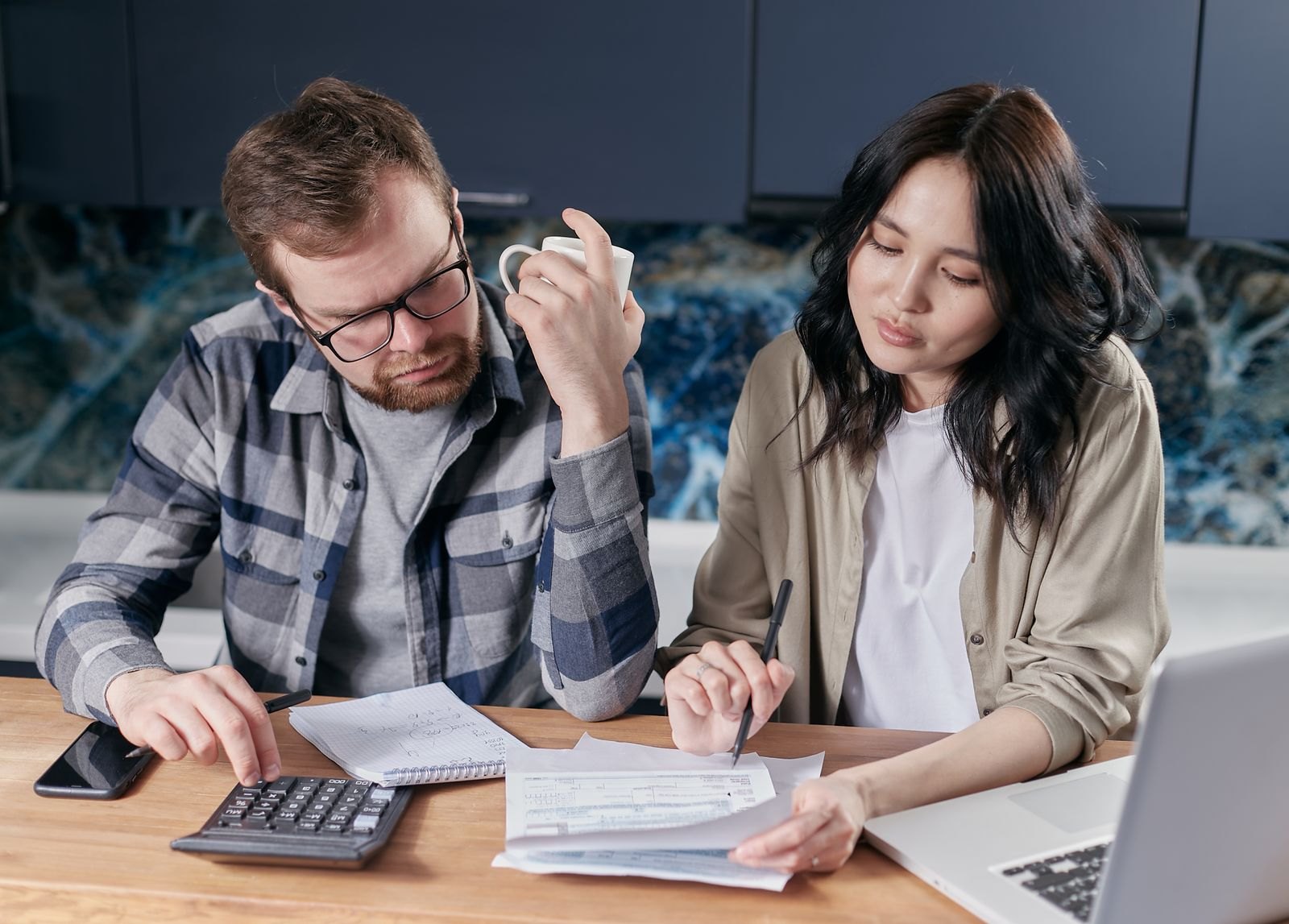 Couple looking at their bills