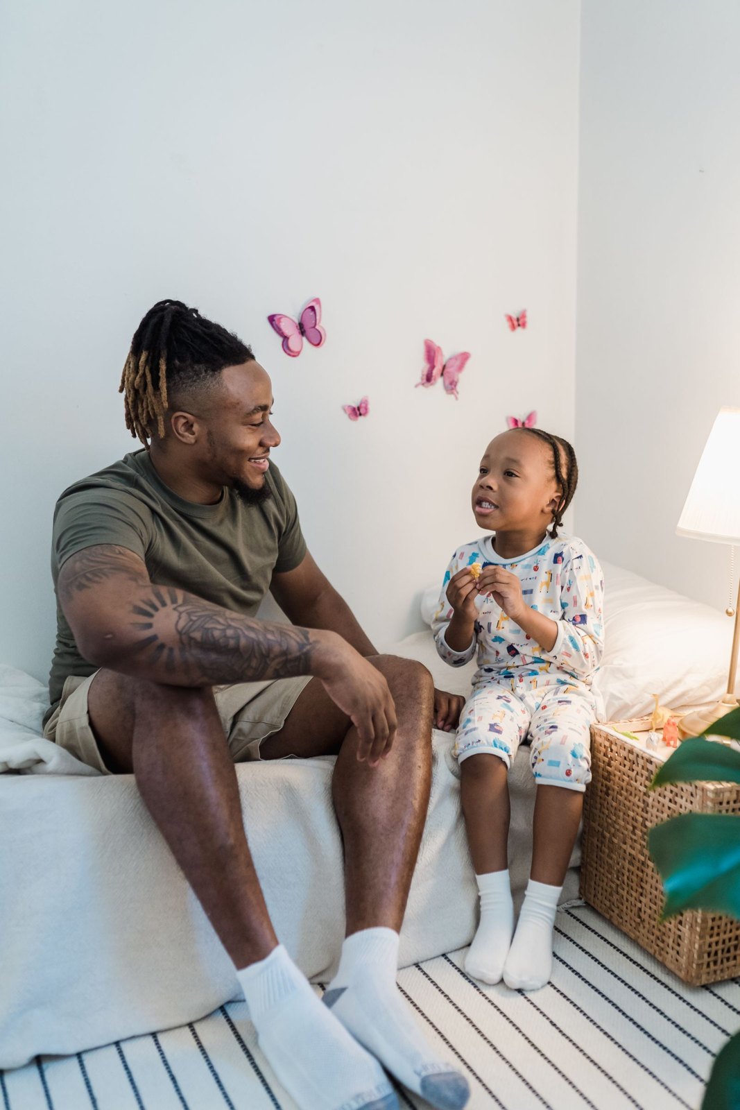 Father and daughter talking before bedtime