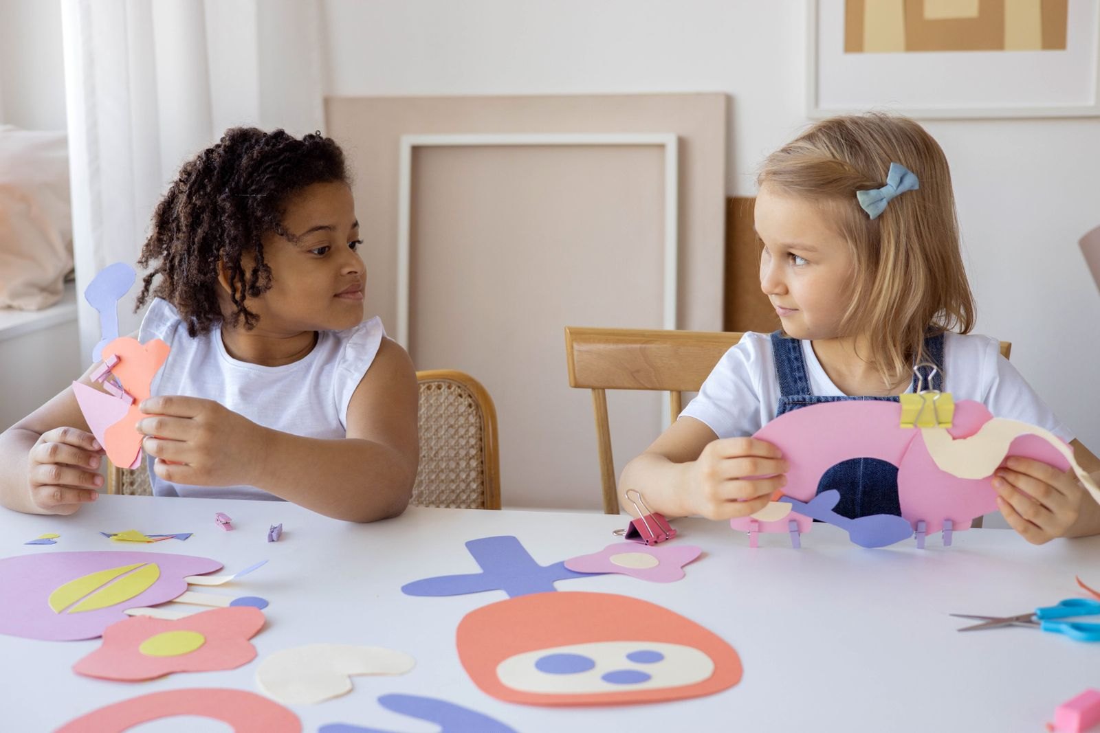 Two kids doing some artworks